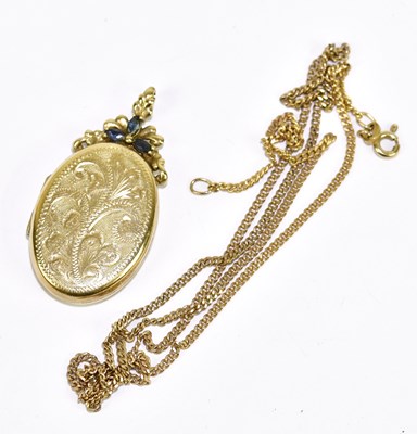 Lot 1229 - A 9ct yellow gold locket of oval form with...