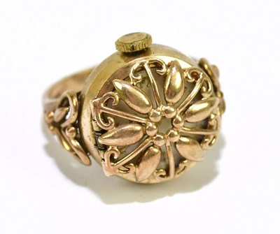 Lot 1034 - A 9ct yellow gold watch ring, the dial set...
