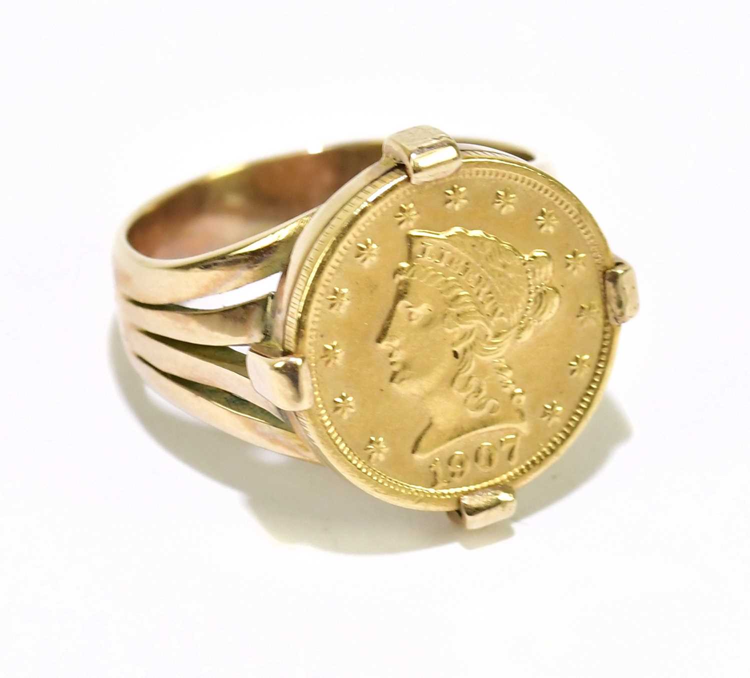 Lot 994 - A yellow metal dress ring stamped 9ct, set...