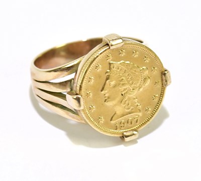 Lot 994 - A yellow metal dress ring stamped 9ct, set...