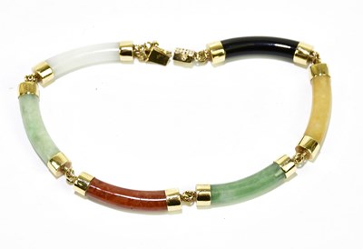 Lot 847 - A yellow metal mounted jade and hardstone...