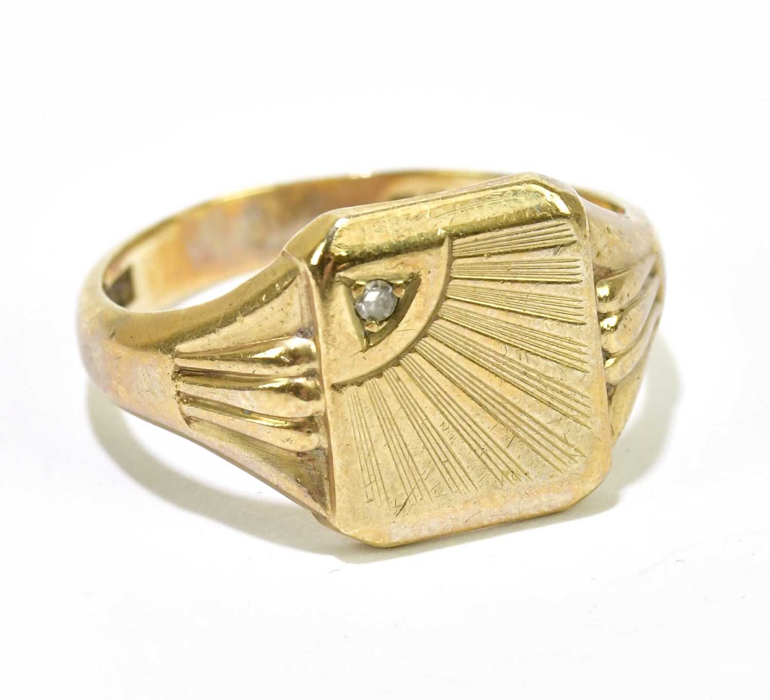 Lot 1078 - A 9ct yellow gold signet ring with sunburst...