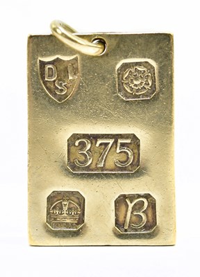 Lot 1236 - A 9ct yellow gold ingot pendant, Sheffield...