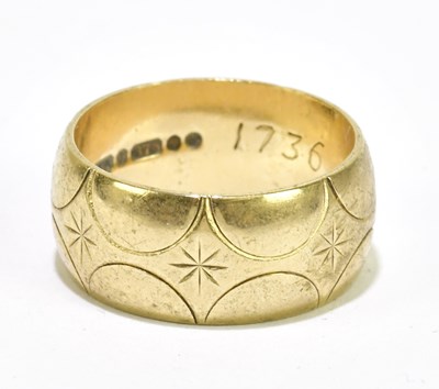 Lot 1031 - A 9ct gold textured wedding band, size K,...