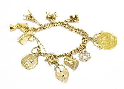 Lot 1170 - A 9ct yellow gold curb link charm bracelet,...