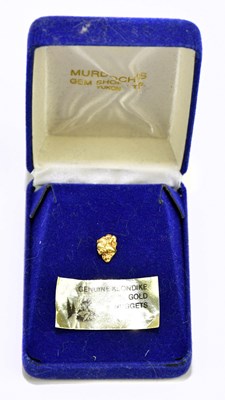 Lot 1291 - KLONDIKE; a gold nugget, cased.