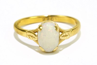 Lot 1012 - A yellow metal dress ring set with a single...