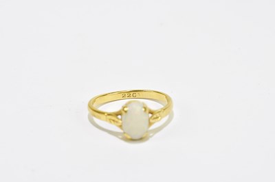 Lot 1012 - A yellow metal dress ring set with a single...