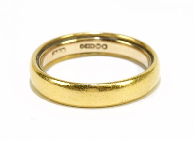 Lot 796 - A yellow metal wedding band with internal...