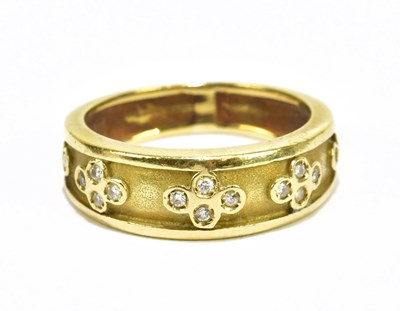 Lot 785 - A yellow metal diamond set dress ring, floral...