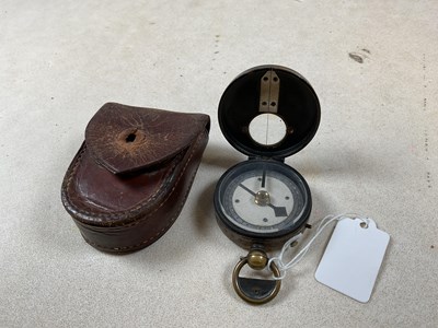 Lot 42 - A WWII period leather cased pocket compass.