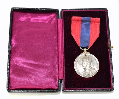 Lot 190 - A George V Faithful Service medal awarded to Florry Cass Haworth, cased.