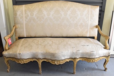 Lot 4 - A late 19th century French giltwood canape...