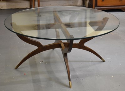 Lot 26 - A stylish mid century teak spider type coffee...