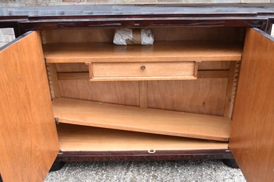 Lot 13 - A contemporary two door breakfront sideboard...