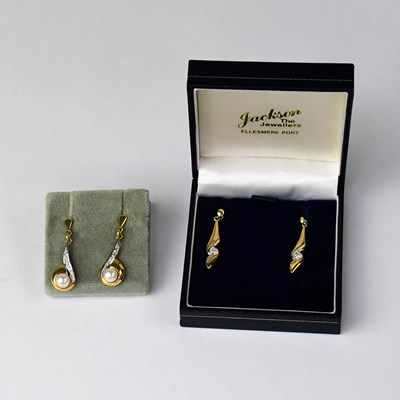 Lot 1186 - Two pairs of 9ct gold drop earrings, one set...