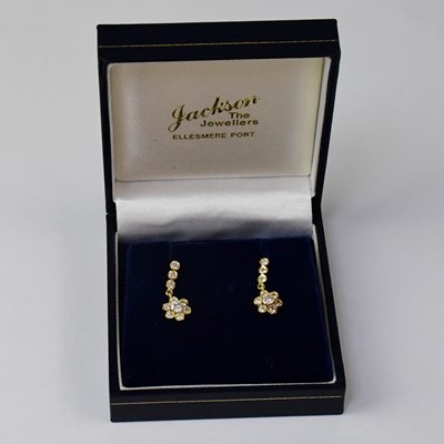 Lot 1174 - A pair of 9ct gold diamond set drop earrings,...