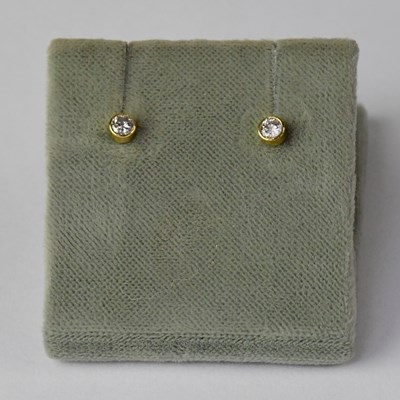 Lot 1170 - A pair of 18ct gold diamond stud earrings...