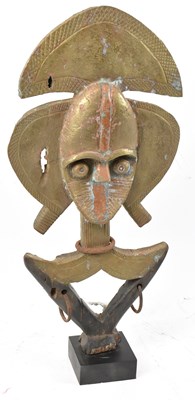 Lot 3 - A Kota reliquary figure, Gabon, brass mounted...