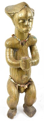 Lot 19 - A Fang reliquary figure, Gabon, entirely clad...