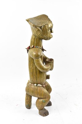 Lot 19 - A Fang reliquary figure, Gabon, entirely clad...