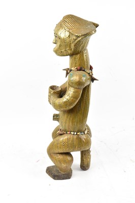 Lot 19 - A Fang reliquary figure, Gabon, entirely clad...