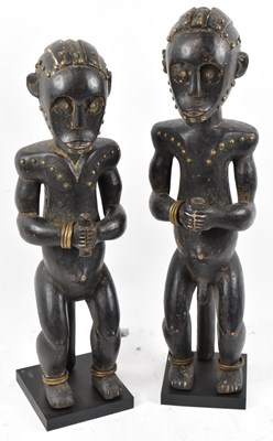 Lot 21 - A pair of Fang, Gabon figures both with brass...