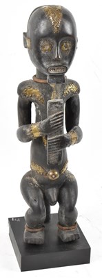 Lot 22 - A Fang reliquary figure, Gabon, applied with...