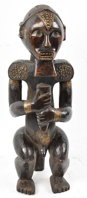 Lot 24 - A Fang reliquary figure, Gabon, applied with...