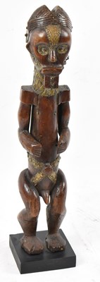 Lot 26 - A fang reliquary figure, Gabon, applied with...