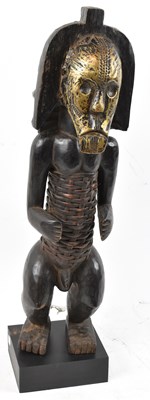 Lot 34 - A Fang, Gabon, figure with brass applied face...