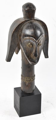 Lot 40 - A Fang, Gabon, figural mask head presented on...