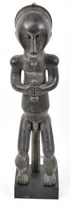 Lot 51 - A Fang, Gabon, standing figure presented on a...