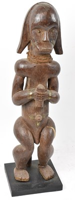 Lot 56 - A Fang, Gabon, standing figure presented on...