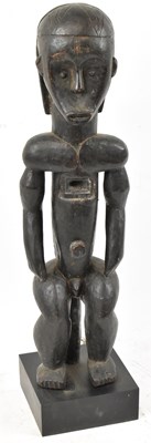 Lot 57 - A Fang, Gabon, standing figure presented on...