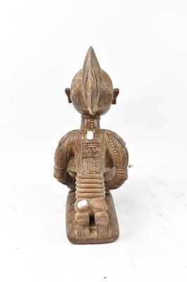 Lot 61 - A Yoruba, Nigeria, figural bowl with traces of...