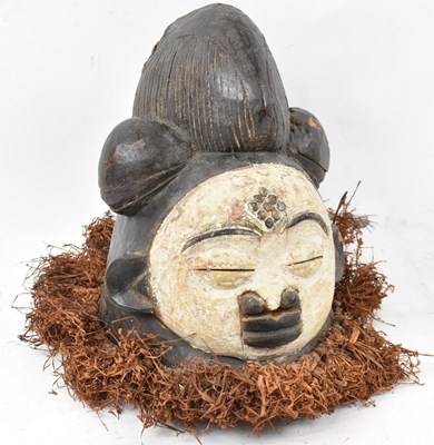 Lot 73 - A Punu, Gabon, dance mask with traces of...