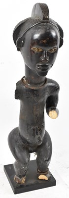 Lot 90 - A Fang, Gabon, standing figure on contemporary...