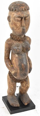 Lot 92 - A Baule, Ivory Coast, standing figure...