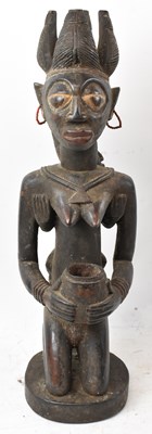 Lot 95 - A Bamileke, Cameroon, kneeling figure with...