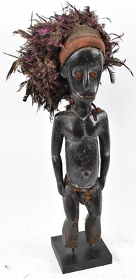 Lot 96 - A Fang, Gabon, figure with feather headdress...