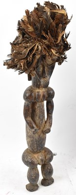 Lot 98 - A Fang, Gabon, standing figure with feather...