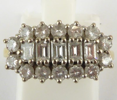 Lot 845 - An 18ct gold diamond cluster ring set with...