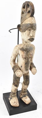 Lot 104 - A Yoruba, Nigeria, standing figure with...