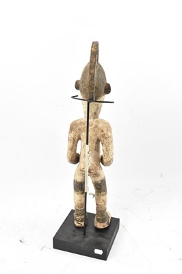 Lot 104 - A Yoruba, Nigeria, standing figure with...