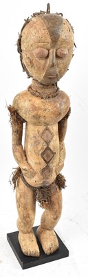 Lot 107 - A Punu, Gabon, standing figure with traces of...