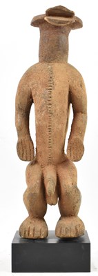 Lot 111 - A Bura, Nigeria, standing figure with bird...