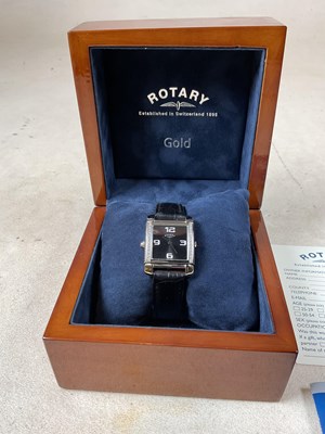 Lot 364 - ROTARY; a Reverso dual time diamond set quartz...