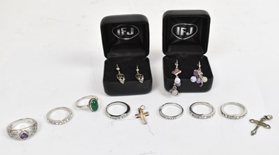 Lot 652 - Seven silver rings, two pairs of hallmarked...