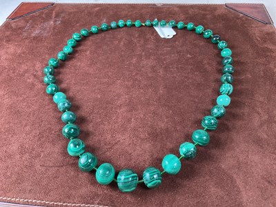 Lot 349 - A graduated malachite necklace. L 78cm